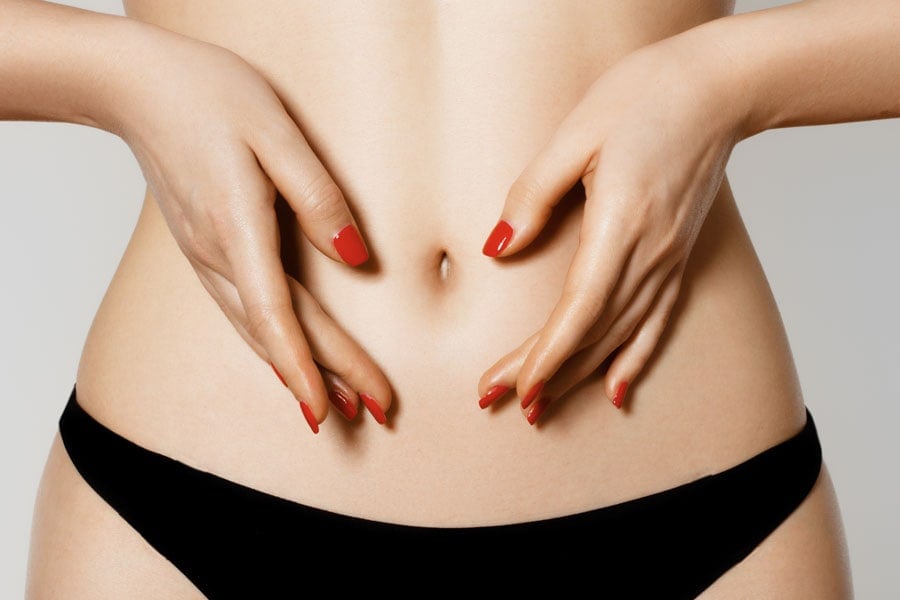 4 Ways to Get Rid of Stretch Marks (And 1 Surefire Way to Hide Them for Good)