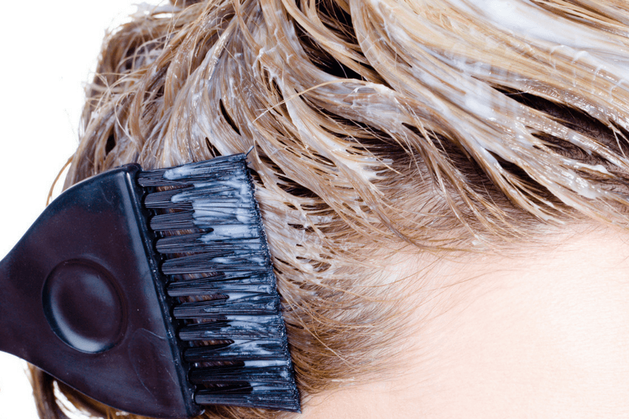 After separating your hair into four sections, then apply the hair color to your hair using a small brush.