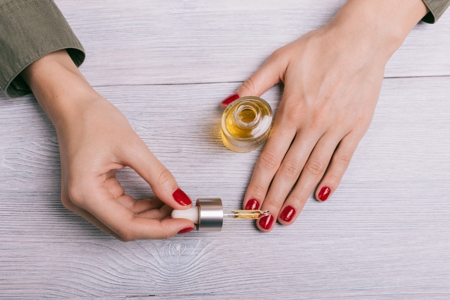 apply natural oils to manicure 1